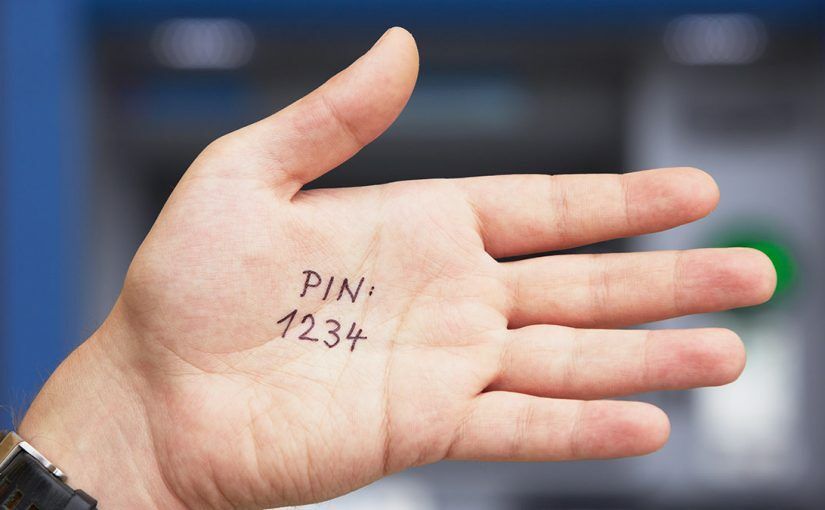 A hand with the phrase "PIN: 1234" written on it.